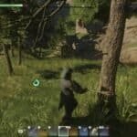 Enshrouded chopping a tree