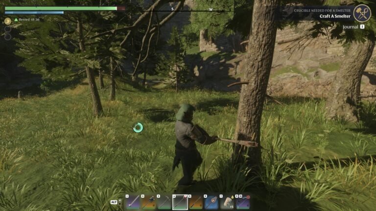 Enshrouded chopping a tree